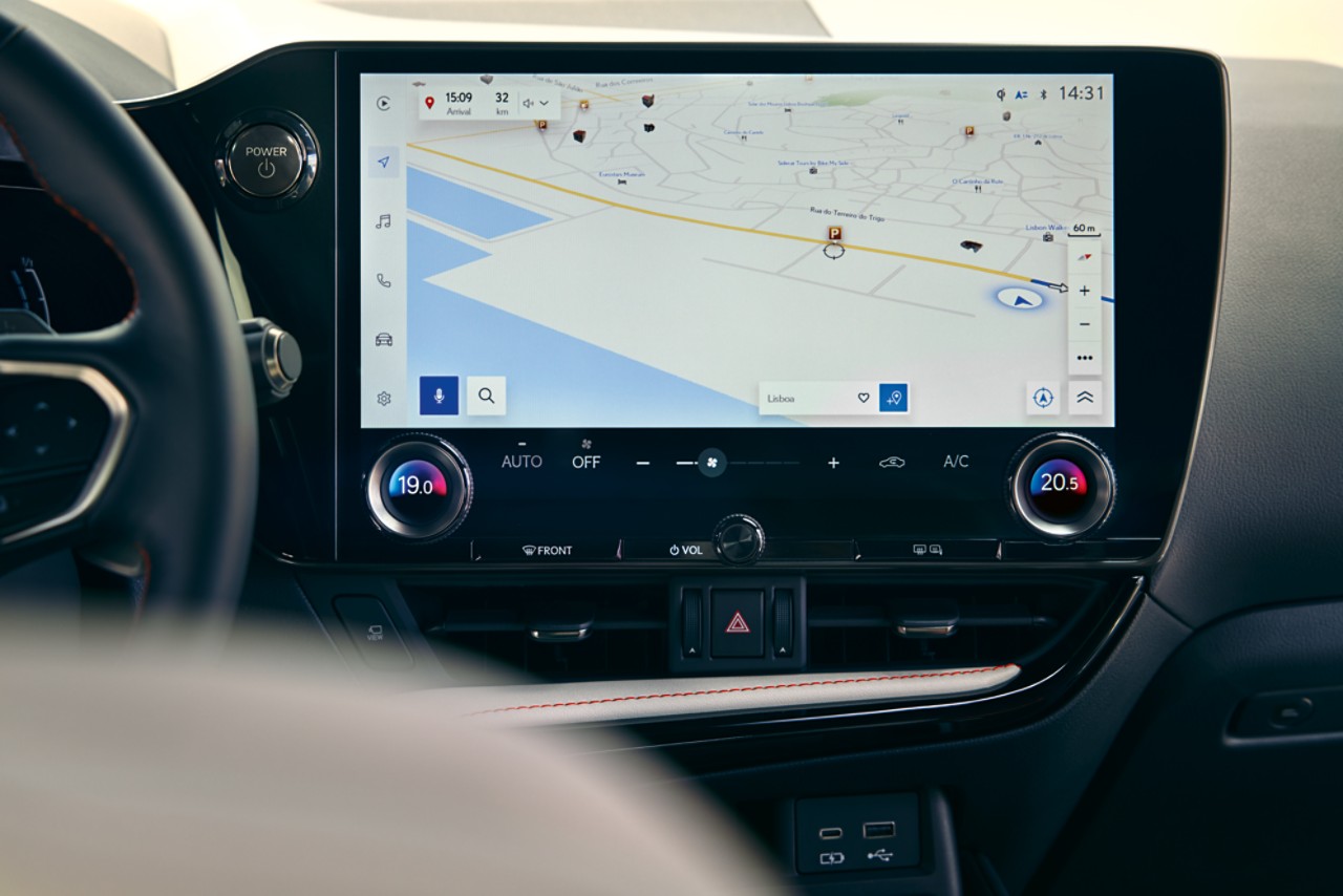 A man sat in a Lexus NX