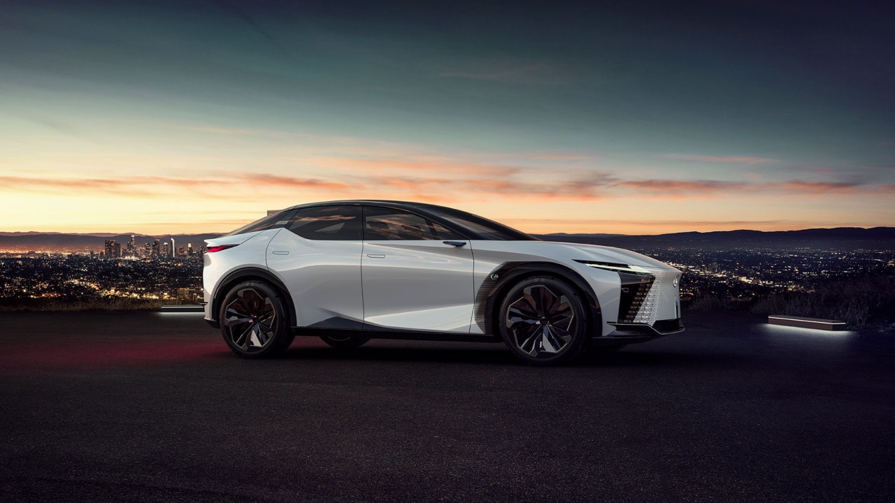 A Lexus LF-Z concept car overlooking a city view 